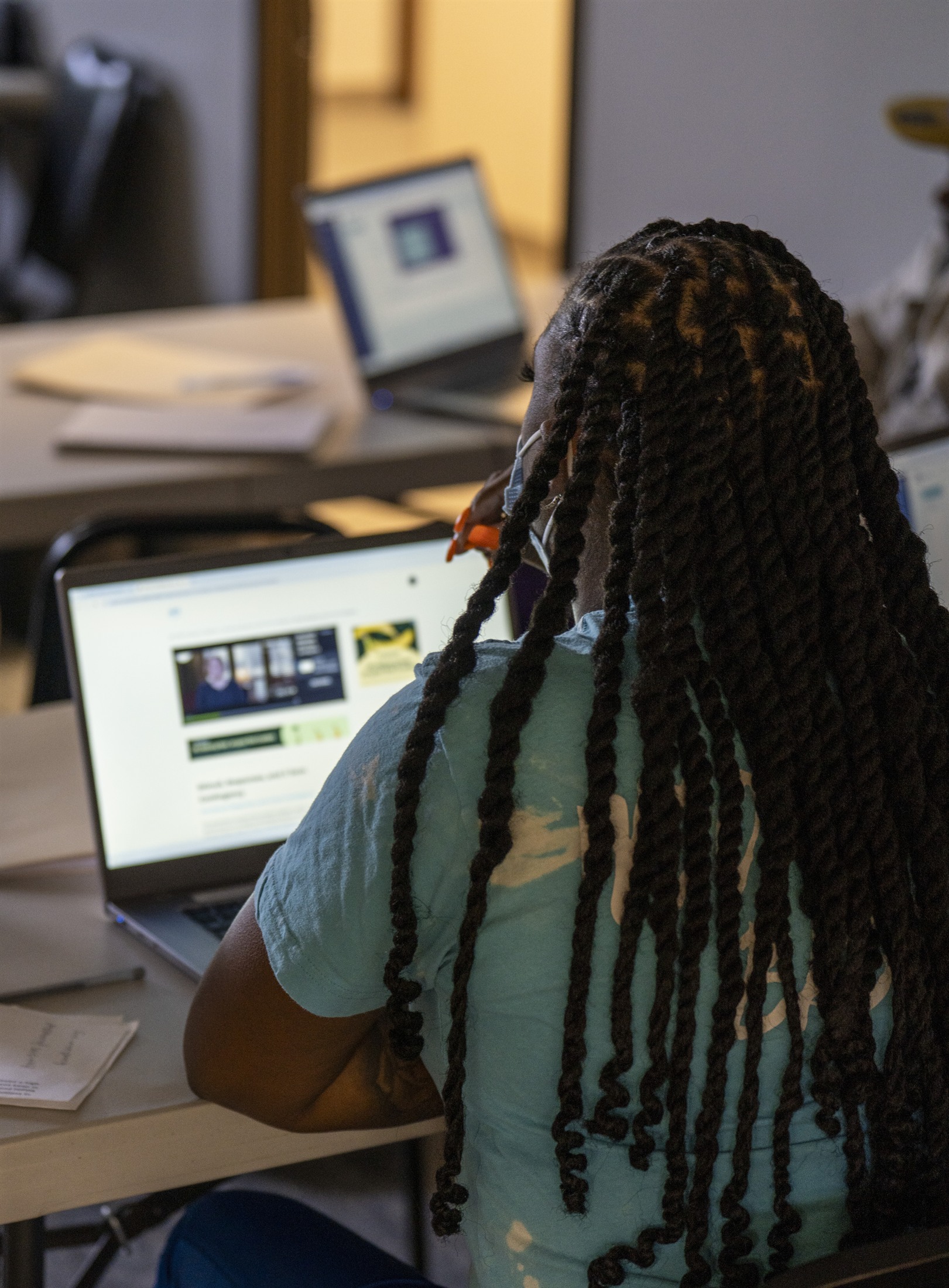 An orientation participant completing online training.